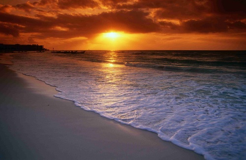 A golden sunrise over the Caribbean