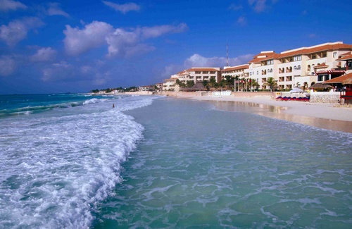 Luxurious apartments and hotels line the beach