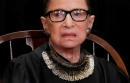 Ginsburg's recovery 'on track' but will miss more U.S. high court arguments