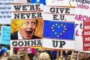 Anti-Brexit activists march to parliament as MPs delay decision