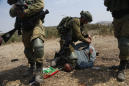 Video shows Israeli soldier kneeling on protester's neck