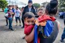 Migrant caravan: Footage shows children being thrown over 18-foot Arizona border fence