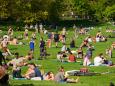 These photos show thousands flocking to New York's parks over the weekend after Mayor de Blasio said that good weather 'is very much a threat to us'