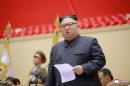 South Korea minister, U.S. sources, say Kim may be sheltering from virus