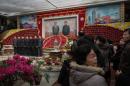 Red blooms and warm glows at Pyongyang' Kimjongilia flower show