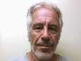 Epstein died by suicide using his jail bed sheet while his guards slept, according to report
