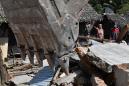 Indonesia quake death toll tops 400 as more bodies recovered