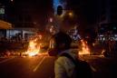 Hong Kong Protesters Battle Police, Set Fire to Key Subway Station