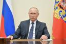Putin prolongs virus work shutdown as cases spike