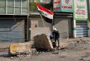 The Latest: Iraqi protesters burn down Iranian consulate