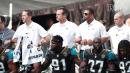 NFL Players Show United Front Against Trump by Kneeling and Locking Arms During National Anthem