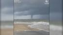Waterspout twists over Chesapeake Bay