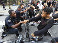 Black cops feel pain of Floyd's death, duty to their uniform