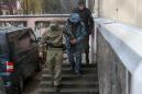 Ukraine bars Russian men from entry as tensions flare