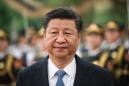 China's Xi pledges to continue reforms, open markets