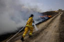 Israel strikes Gaza militant sites after incendiary balloons