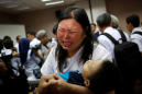 Tearful relatives of Indonesia jet crash victims demand answers