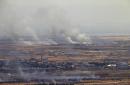 Israel forces hit Syria army after new stray fire