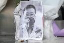 Death of Chinese doctor fuels anger, demands for change