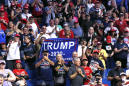 Trump comeback rally features empty seats, staff infections