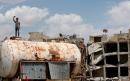 US denies involvement in Syria missile strike which kills 12 
