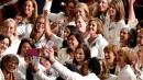 Women send political message by wearing white to Trump's State of the Union