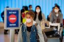 Are more coronavirus travel restrictions coming? Experts say they only delay the inevitable