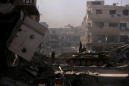 Syria's army captures last insurgent area near Damascus