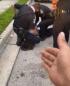 Florida police officer put on leave after pinning black man to the ground with knee