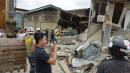Strong quake kills 1, collapses building in Philippines