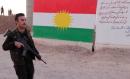 Kurds block Iraqi forces' access to Kirkuk oil fields; Iran shuts border crossings