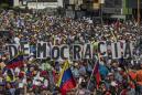 Venezuelans March as Guaido and Maduro Vie for Legitimacy