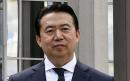 Missing Interpol chief 'submits resignation' after China admits to holding him for questioning 
