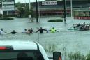 The story behind that inspiring picture of a human chain in Houston
