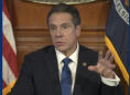 Cuomo says "no time for politics" as virus death toll jumps