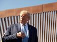 Video shows people scaling US border wall in seconds - despite Trump insisting it 'can't be climbed'