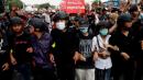 Thai protesters confront royals in Bangkok visit