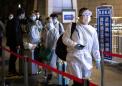 Asia virus latest: Wuhan travel ban lifted, Japan under state of emergency