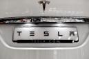 Tesla sacks hundreds of workers on Model 3 stall: source