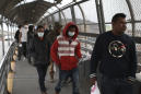 Official: Strict US border policy may remain as virus eases