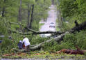 Storms tear through South amid pandemic; more than 30 dead