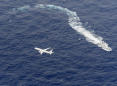 U.S. military air crash off Japan coast kills one Marine, five missing