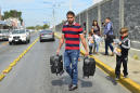 US returns first group of asylum seekers to Nuevo Laredo