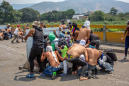 Violent Clashes Strand Aid Caravans Along the Venezuela-Colombia Border