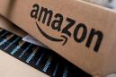 Amazon holiday sales jump as one-day shipping pays dividends, stock up 13%