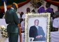 Zimbabwe's Mugabe buried in home village, ending an era