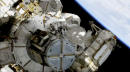 NASA conducts spacewalk as world's 1st spacewalker dies