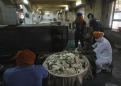 Sikh kitchens feed New Delhi's masses in virus lockdown