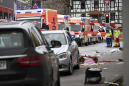 Car hits crowd at Carnival in German town; dozens injured