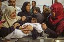 Israel faces outcry after 60 killed on Gaza border